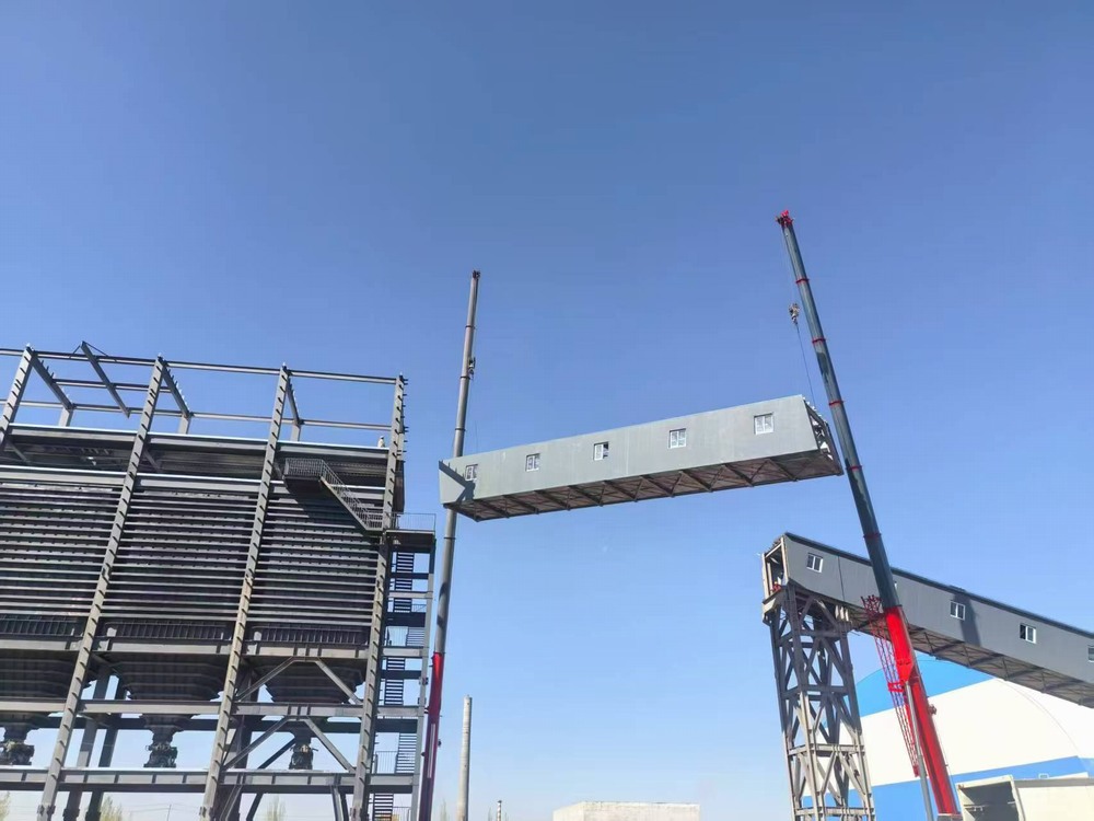 陜煤建設(shè)天工公司新疆第一項(xiàng)目部：雙機(jī)協(xié)作展絕技，棧橋凌空貫長(zhǎng)虹